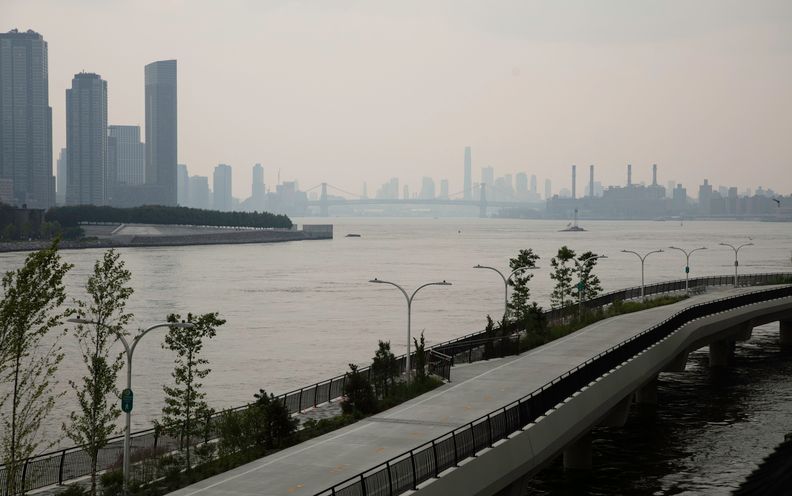 Wildfire smoke lingers over the East River